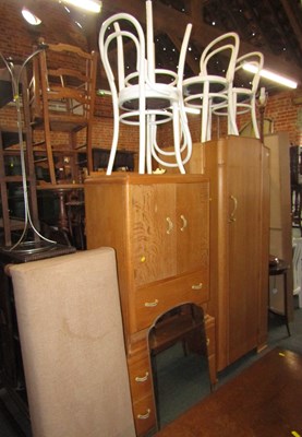 Lot 1067 - A stool, an oak finish two door cupboard with...