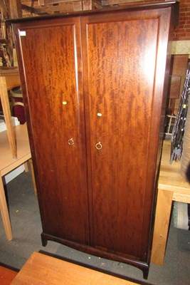 Lot 1074 - A Stag two door wardrobe, rail to interior,...