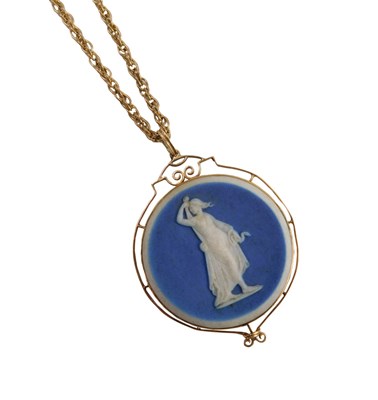 Lot 294 - A Wedgwood blue Jasperware pendant, depicting...