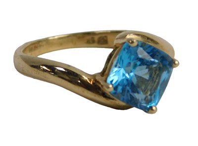 Lot 295 - A QVC 9ct gold and topaz ring, claw set, size...