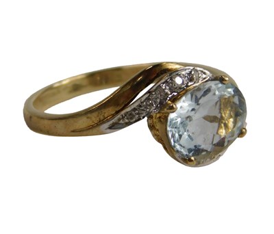 Lot 297 - A QVC 9ct gold aquamarine and diamond ring,...