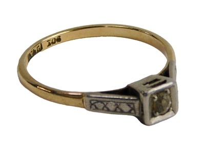 Lot 580 - A diamond ring, in claw setting, in a square...
