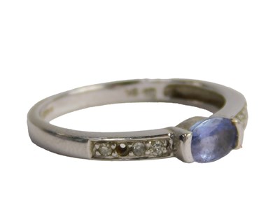 Lot 589 - A QVC 9ct white gold and amethyst ring, the...