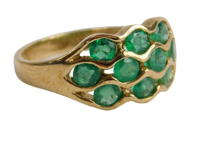 Lot 590 - A QVC 9ct gold and emerald ring, set with ten...
