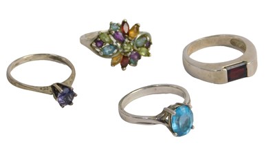 Lot 591 - Four white metal stone set rings, three...