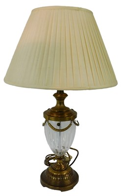 Lot 374 - A brass and lead crystal table lamp, of urn...