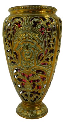 Lot 554 - A 19thC French pierced brass vase, decorated...