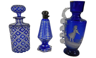Lot 576 - A group of blue glassware, comprising a Mary...