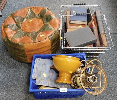Lot 2015 - A leather pouffe, table lamp, crockery stands,...