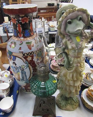 Lot 2040 - Two large frog statues, one male one female,...