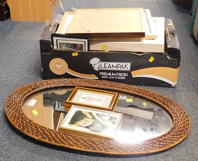 Lot 2053 - A cane surrounded oval mirror, and a box...