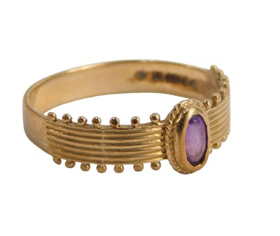 Lot 598 - A 9ct gold and amethyst ring, the oval...