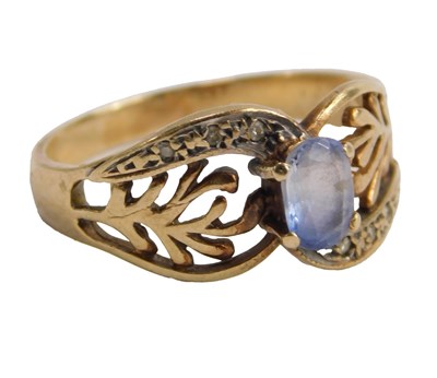 Lot 603 - A 9ct gold dress ring, the oval pale blue...
