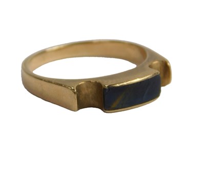 Lot 597 - A 9ct gold and tiger's eye dress ring, size L,...