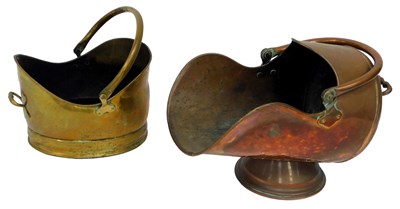 Lot 668 - A copper coal scuttle, with ring handle, on...