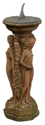 Lot 676 - A composition stone sundial, the cast metal...