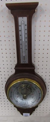 Lot 2164 - A small wheel barometer, with a temperature...