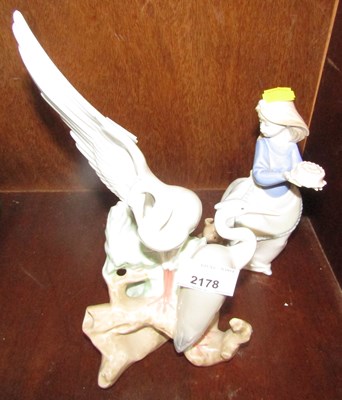 Lot 2178 - Two Nao ceramic figures, one of cranes, the...