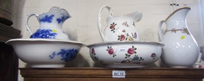 Lot 2213 - Two wash basins and wash jugs, and a singular...