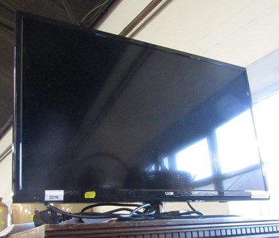 Lot 2216 - A Logic flat screen television, with remote,...