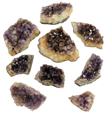 Lot 685 - A group of raw amethyst geodes, differing...