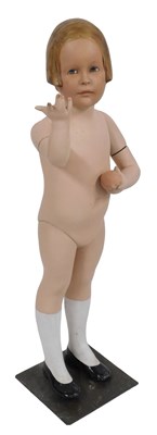 Lot 700 - An early 20thC advertising doll, her blonde...