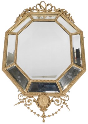 Lot 710 - A late 19thC French gilt gesso cushion mirror,...