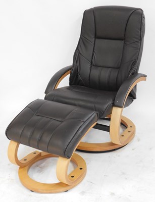 Lot 727 - A Stressless style brown leather armchair, on...