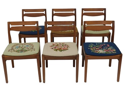 Lot 729 - A set of six 1970s teak dining chairs, each...