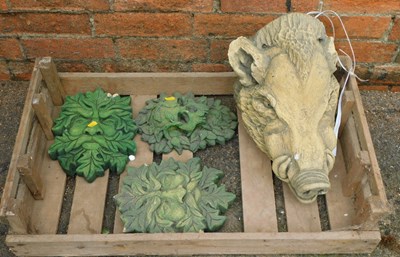 Lot 1124 - Three green painted face mask wall plaques,...