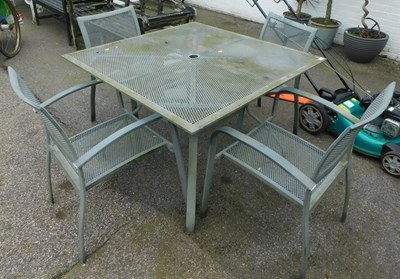 Lot 1132 - A garden table, with four chairs, table 75cm...
