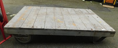 Lot 1137 - A large wooden industrial trolley.