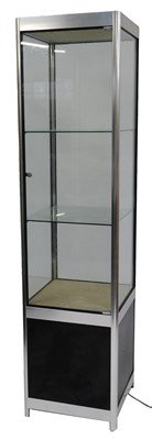 Lot 781 - A glass display cabinet, of square form, with...