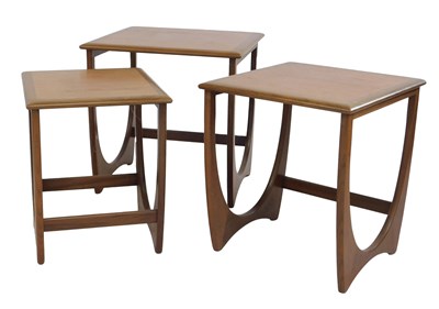 Lot 784 - A nest of three G-Plan teak tables, each...