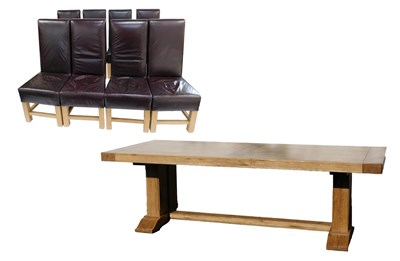 Lot 802 - A contemporary oak dining table, the...