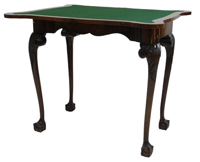 Lot 805 - A 19thC mahogany games table, the shaped top...