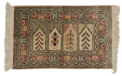 Lot 827 - A Turkish silk prayer type cream ground...
