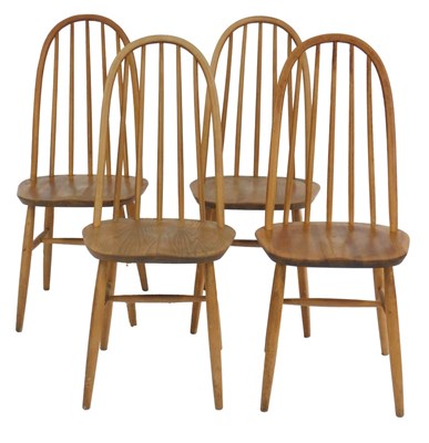Lot 752 - A set of four Ercol style light elm and beech...