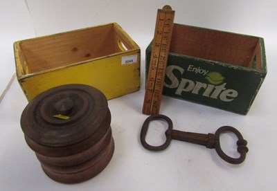 Lot 2243 - Treen including two advertising crates, cast...