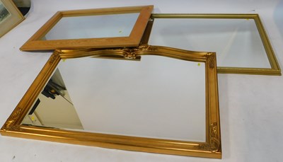 Lot 2277 - Three bevelled mirrors, one in a wooden frame,...
