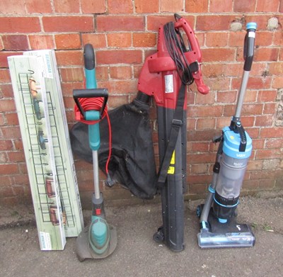 Lot 1106 - A VAX upright vacuum cleaner, together with a...