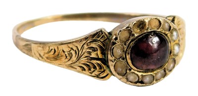 Lot 340 - A Victorian red cabochon and seed pearl ring,...
