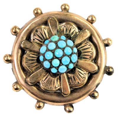 Lot 334 - A Victorian turquoise set circular capstan...