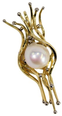 Lot 307 - An 18ct gold and Baroque pearl pendant, in an...
