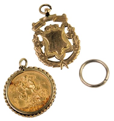 Lot 316 - A George V gold full sovereign 1912, in a 9ct...