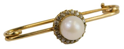Lot 325 - A cultured pearl brooch, in a surround of...