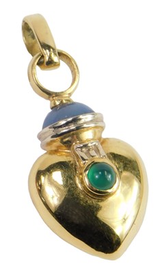 Lot 313 - An 18ct gold cabochon sapphire and emerald...