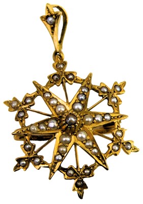 Lot 335 - A Victorian seed pearl set brooch, in a floral...