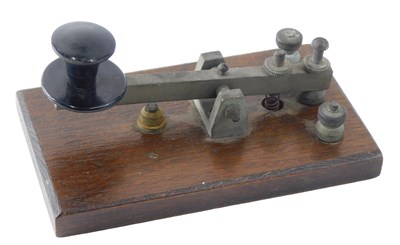 Lot 126 - An early 20thC brass and bakelite telegraph or...