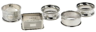 Lot 386a - Five various silver napkin rings, 2.61oz.